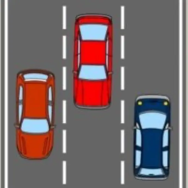 Imagen de apoyo para la pregunta: ¿Dónde debe colocarse para cambiar de dirección a la izquierda en esta vía de doble sentido y tres carriles?
